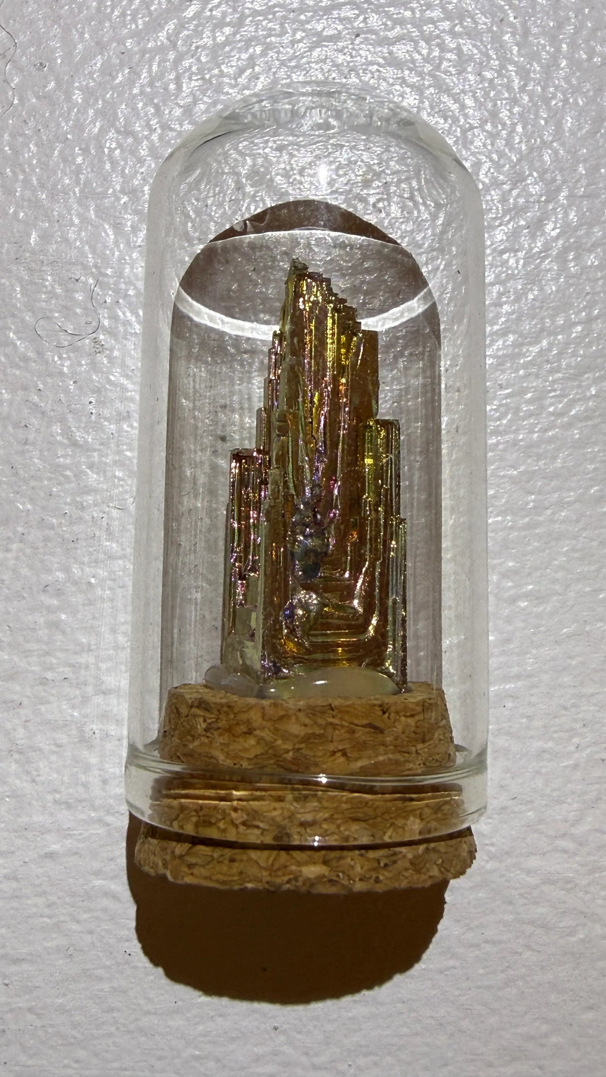 mini bismuth capsulated in a cloche with cork 