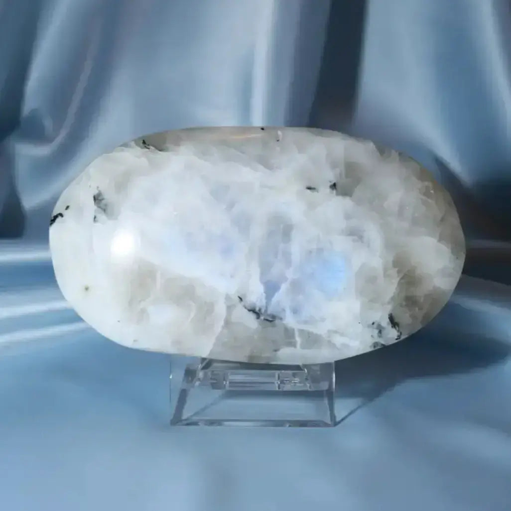  A polished rainbow moonstone palm stone or pocket stone with blue flash 