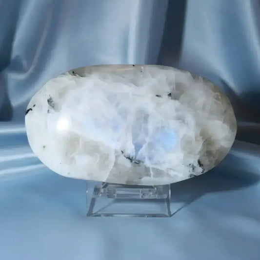  A polished rainbow moonstone palm stone or pocket stone with blue flash 