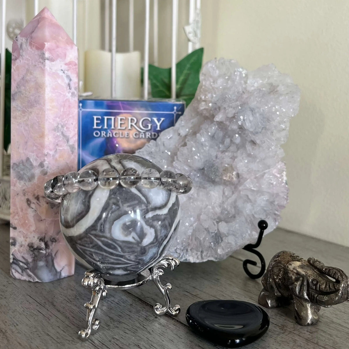 nice close up of entire set pink opal tower, thousand eye sphere pyrite elephant 