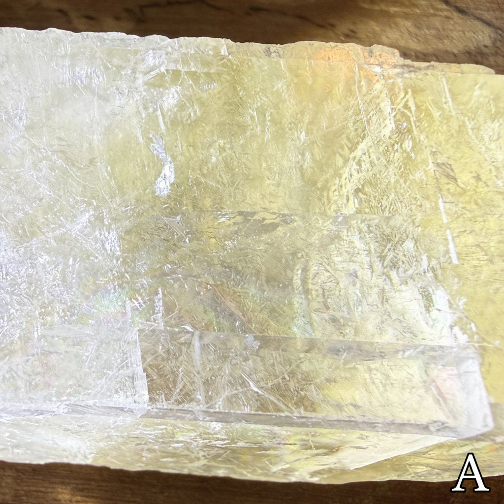 Close up of raw white calcite specimen A beautiful fractures slightly yellow 