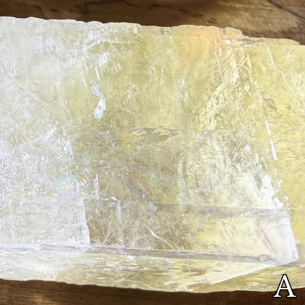 Close up of raw white calcite specimen A beautiful fractures slightly yellow 