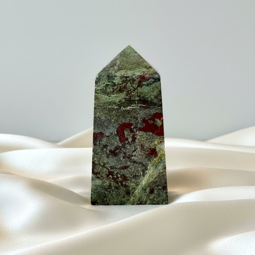 Reverse Side of dragons blood mini tower showing emerald greens and red jasper 