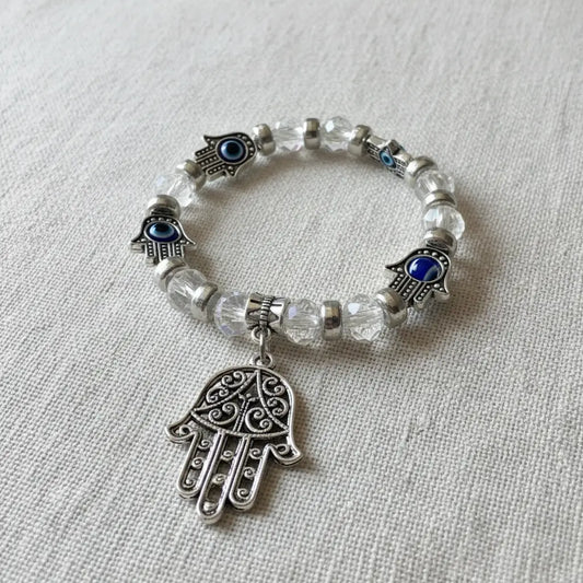 Evil eye bracelet with Hamsa hand charm and clear crystal beads