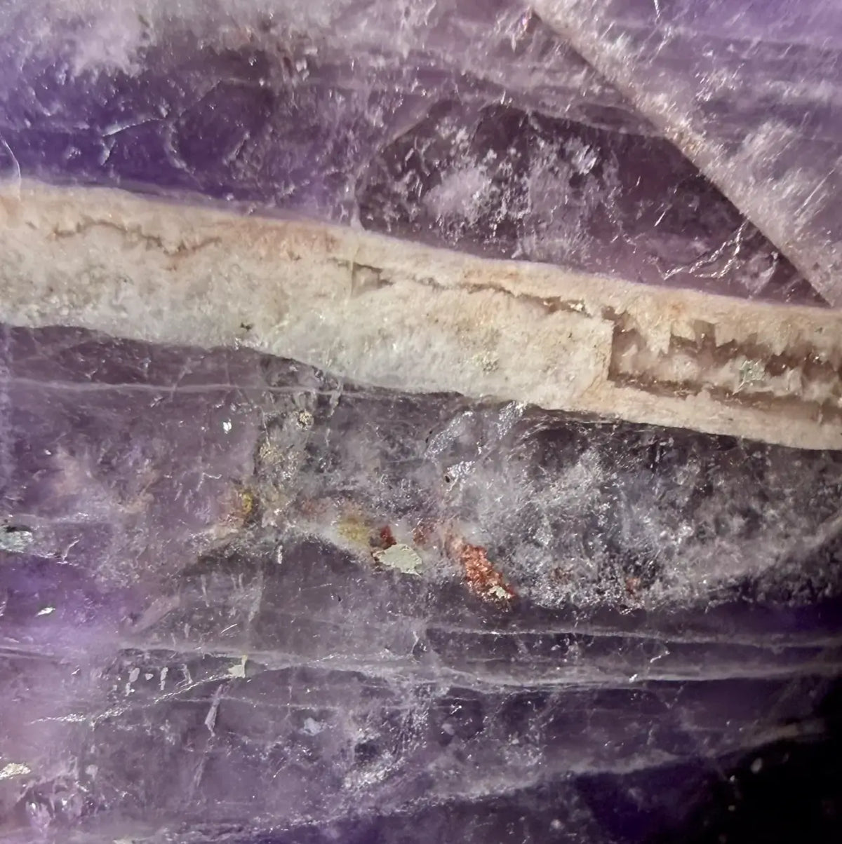 magnified close up druzy amethyst sphere 