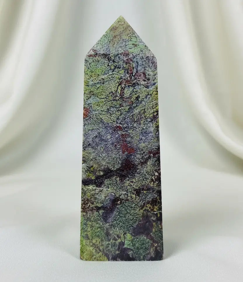 Side View of a dragons blood tower  four side tower with greens and red