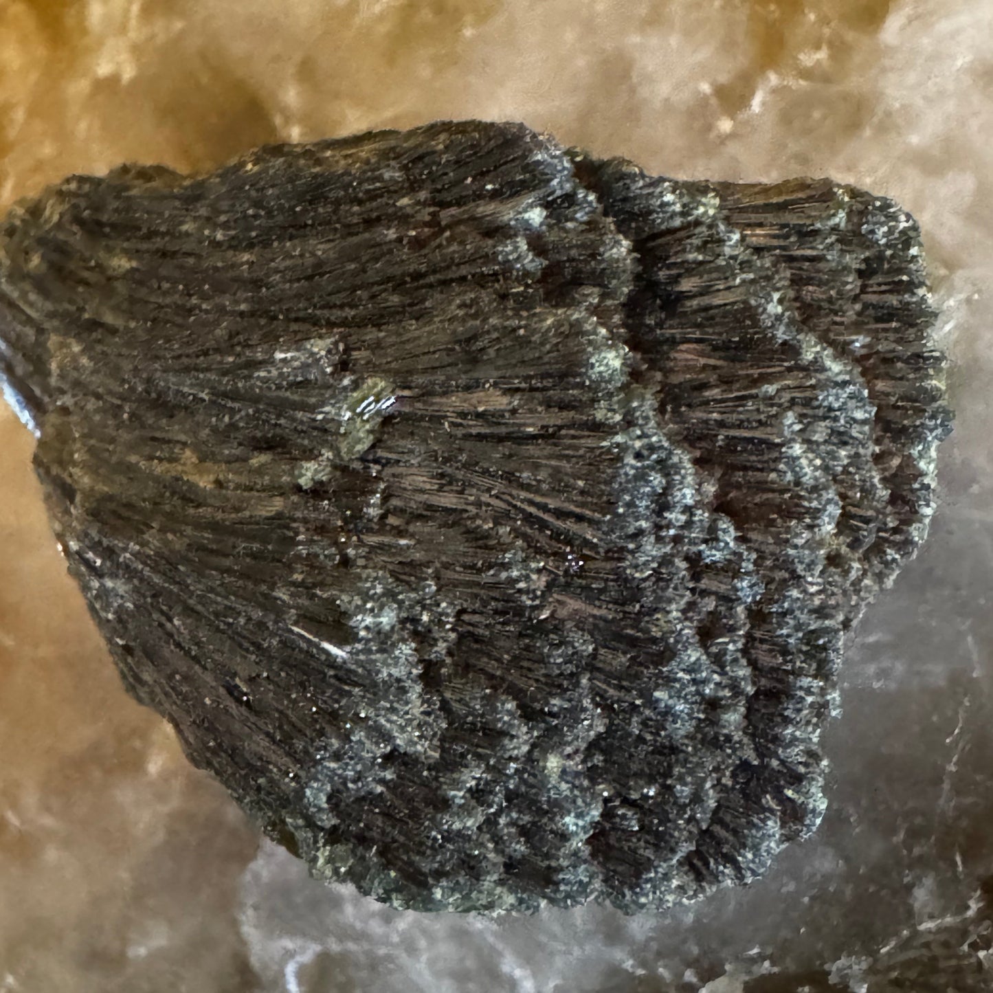 Close up side view of Epidote Raw Specimen