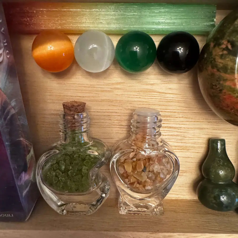 Keepsake box (wood and hand painted) contents Rainbow Selenite, cats eye spheres, hulu for good luck, trwo wish bottles