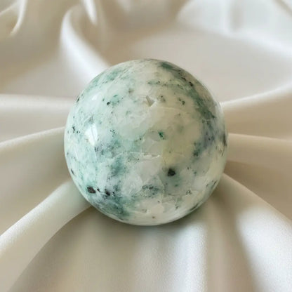 chrysocolla in quartz sphere green, blue druzy pockets