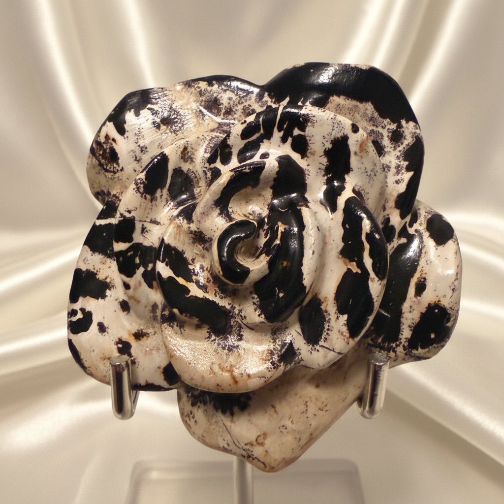 close up of dendritic agate carved flower warm brown, soft tones sand colors