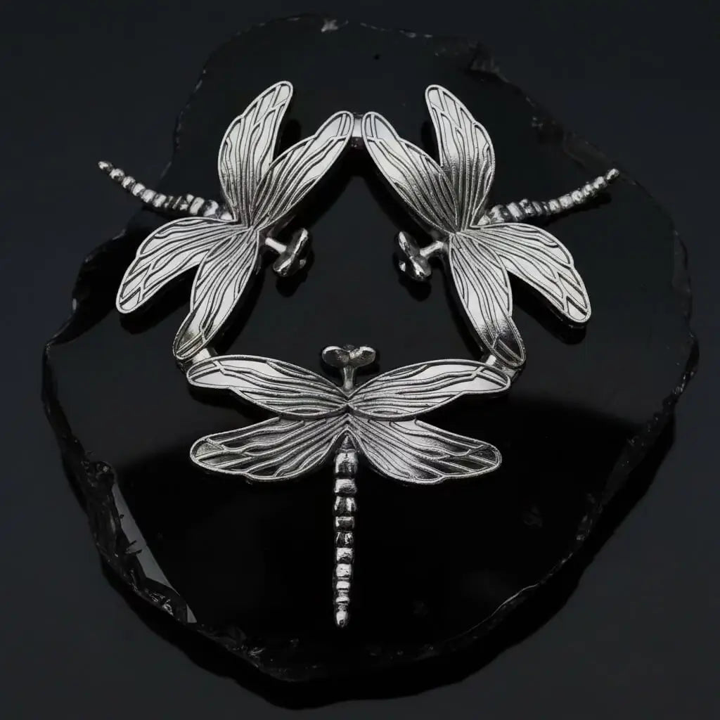 Close-up silvery dragonfly sphere display stand 