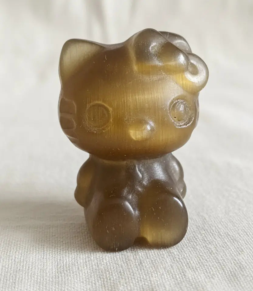 caramel color chatoyant selenite hello kitty carving 