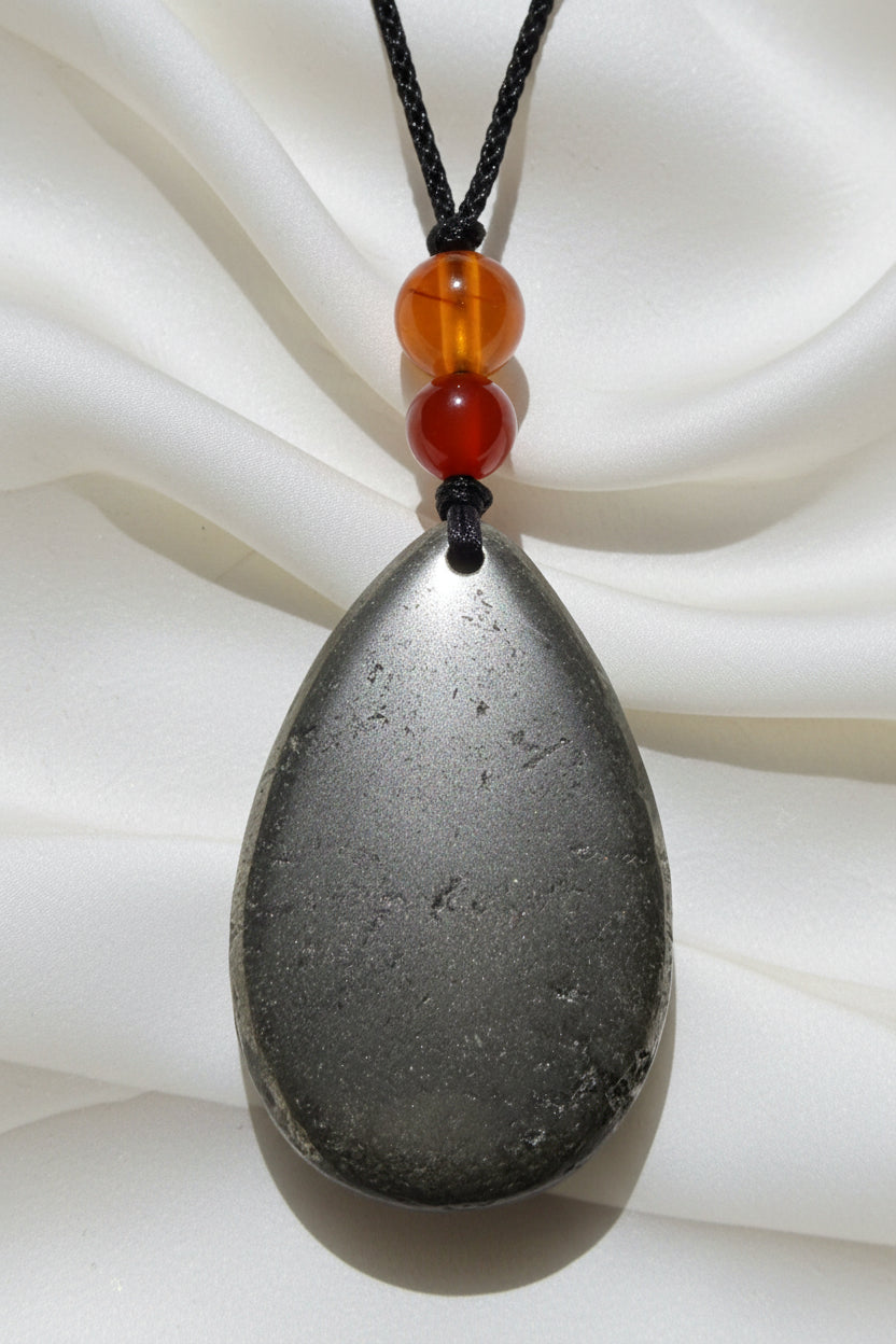 Hematite Pendant with carnelian bead adjustable cord
