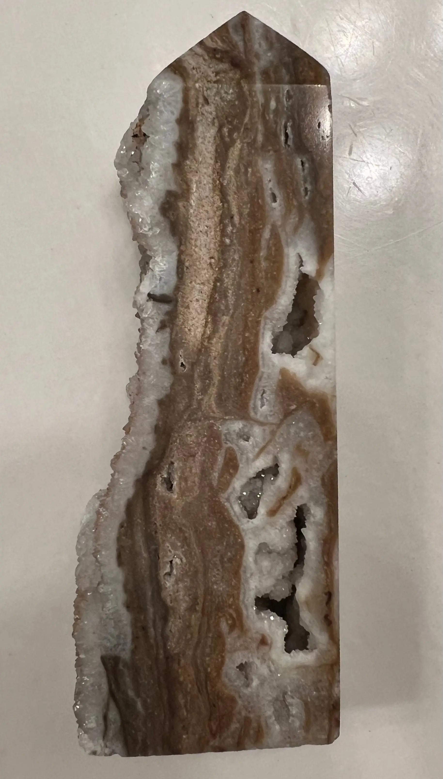 Banded Agate tower showing sparkly Druzy Quartz pocket