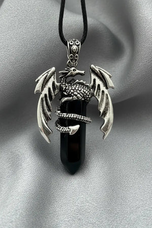Dragon pendant necklace with black gemstone, silver dragon with spread wings.