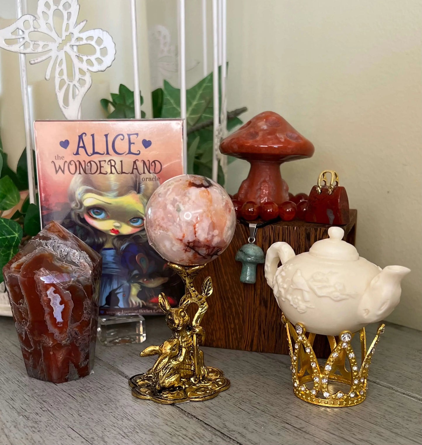 Alice in Wonderland Red Agate Warrior crystal set front display