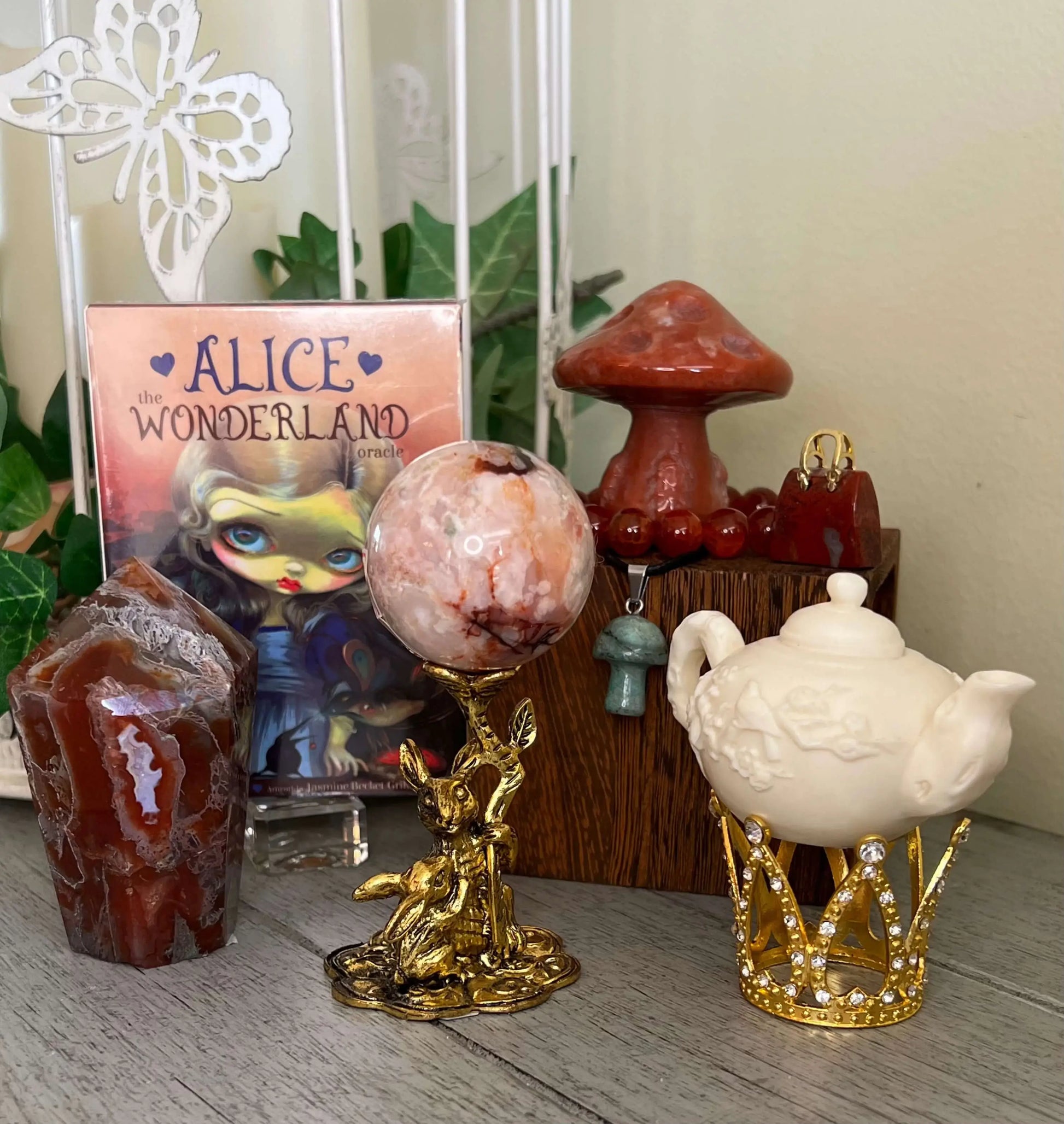 Alice in Wonderland Red Agate Warrior crystal set front display