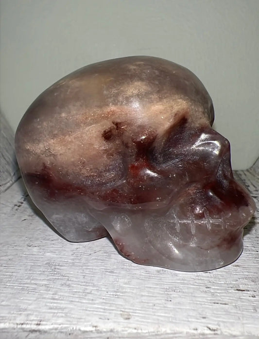 Agate skull with Red Jasper crystal carving front view