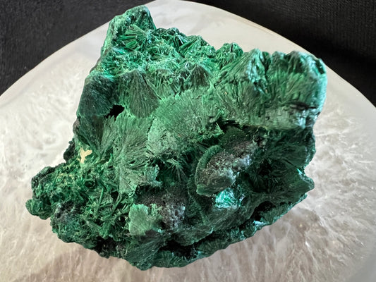 Close-up of a green malachite mineral specimen.