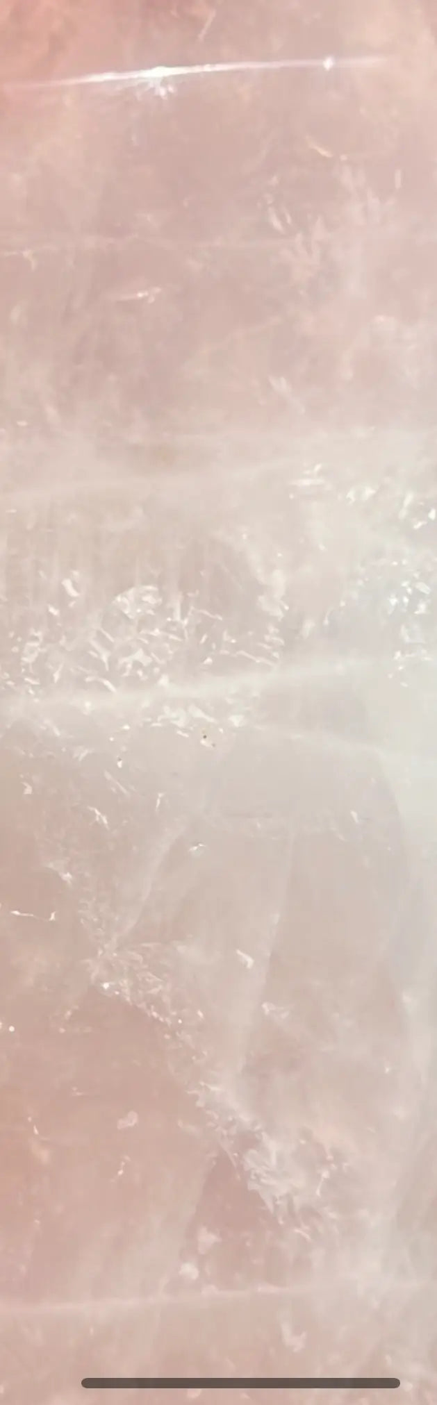 Pale pink Rose Quartz crystal close-up