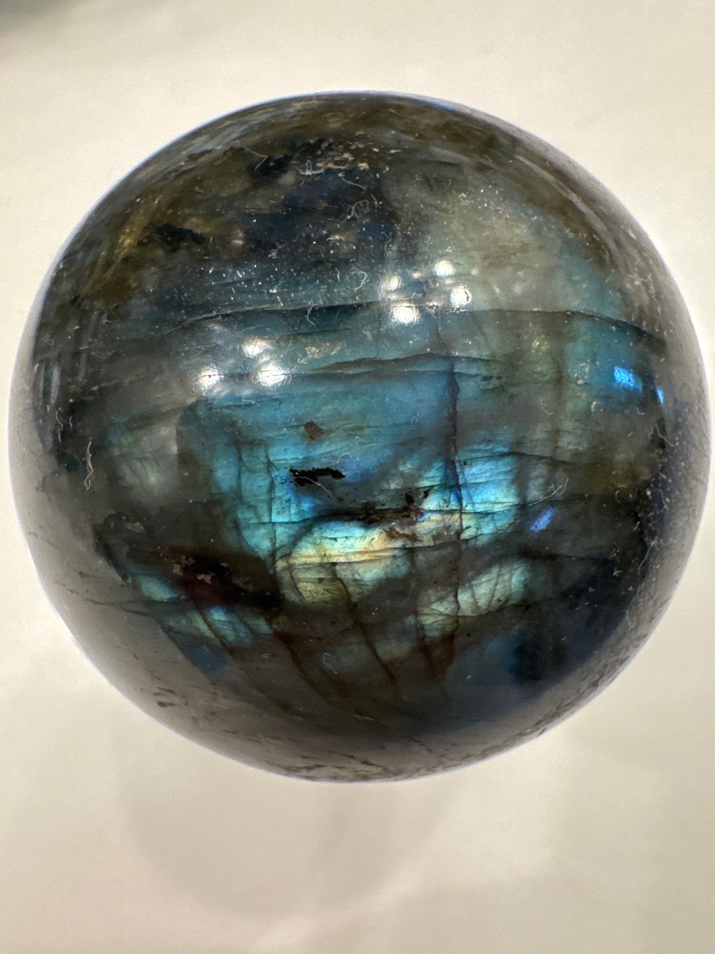 Labradorite sphere with high labradorescence from Madagascar