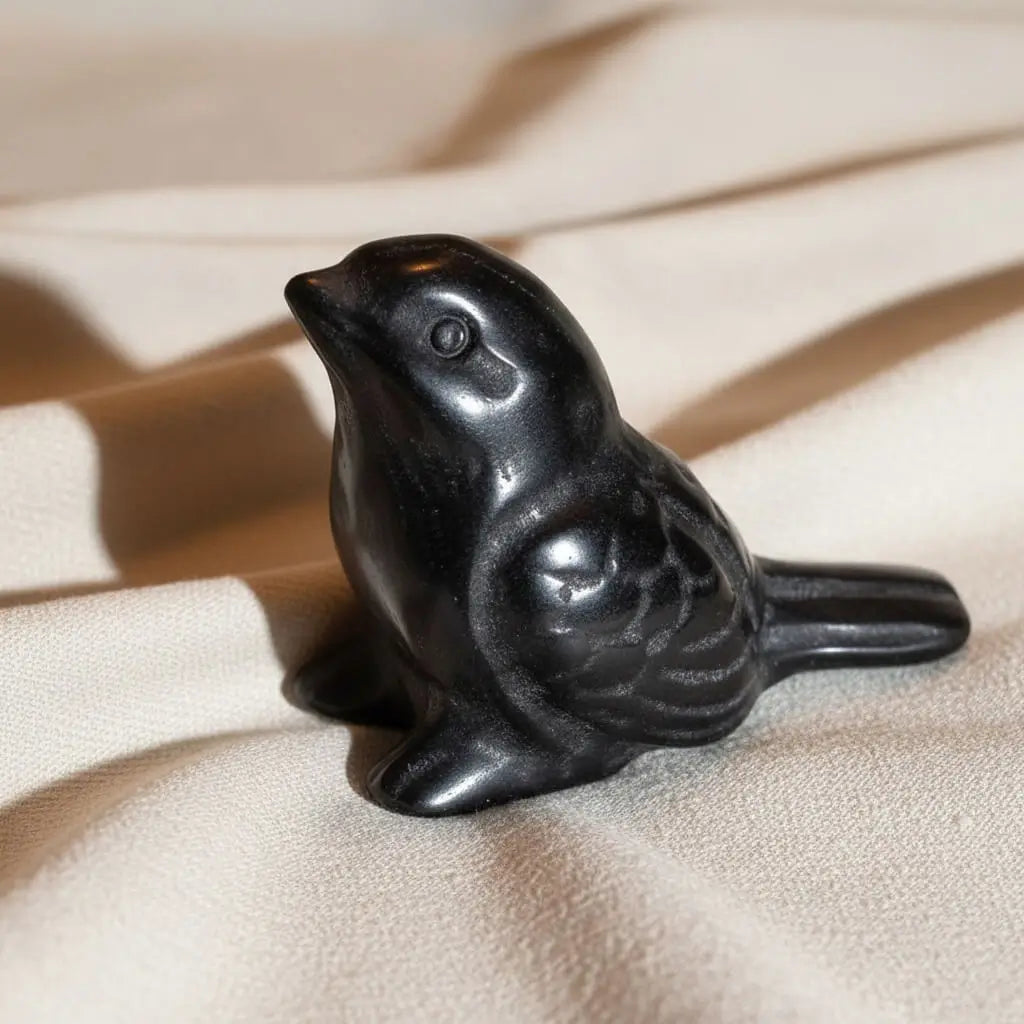 Hand-carved Black Obsidian bird figurine from Emotional Support & Anxiety Relief Crystal Set