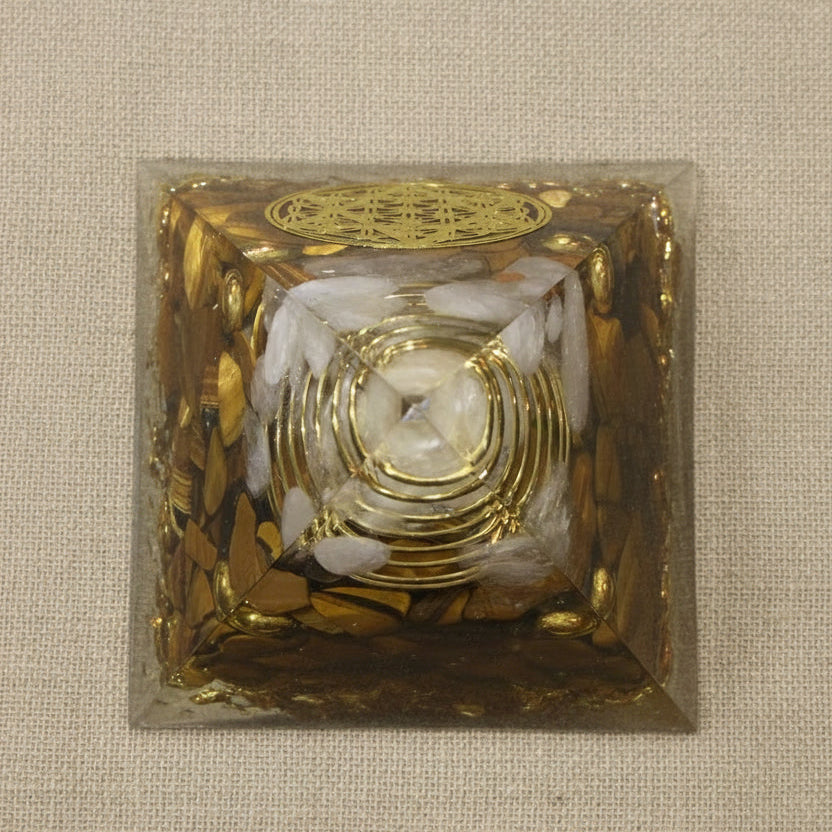Orgonite tigers eye, clear quartz and copper bits and coil 