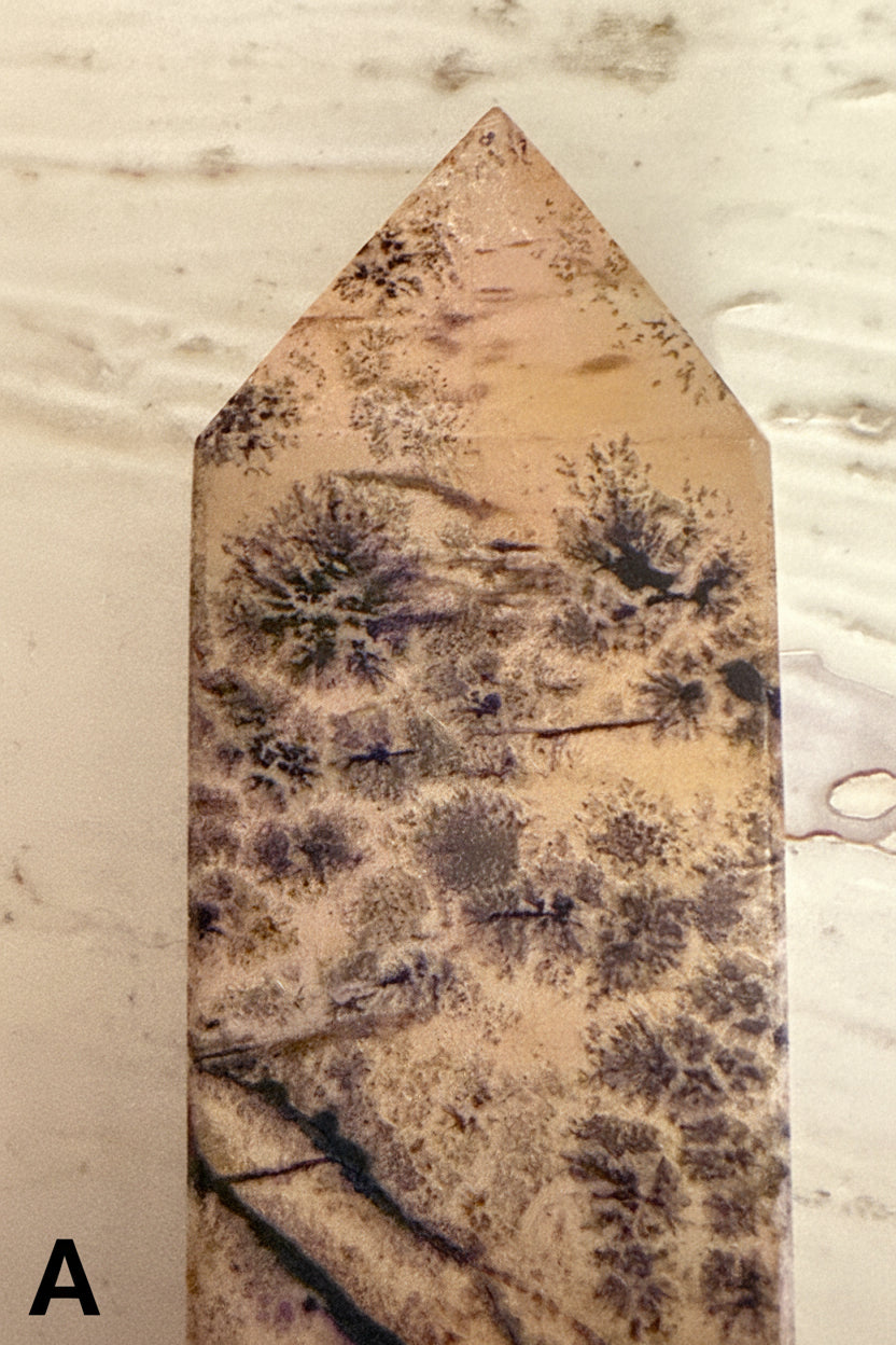 close up showing clean tip of this tower a picture jasper photo of picture jasper tower showing banding and dendritic inclusions 
