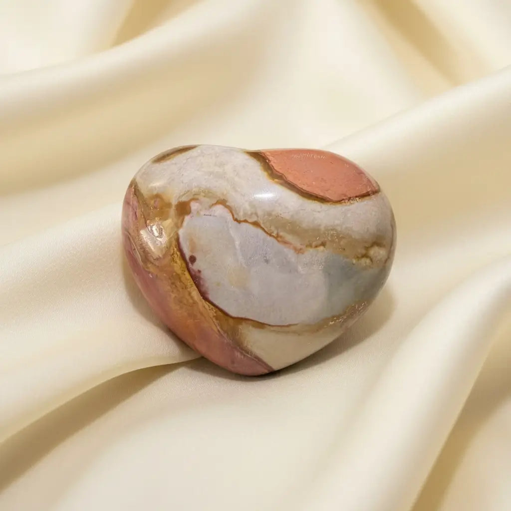 Carved polychrome jasper heart oranges, browns intense colors with iron inclusions