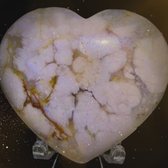 AI generated sparkles on a genuine flower agate crystal carving