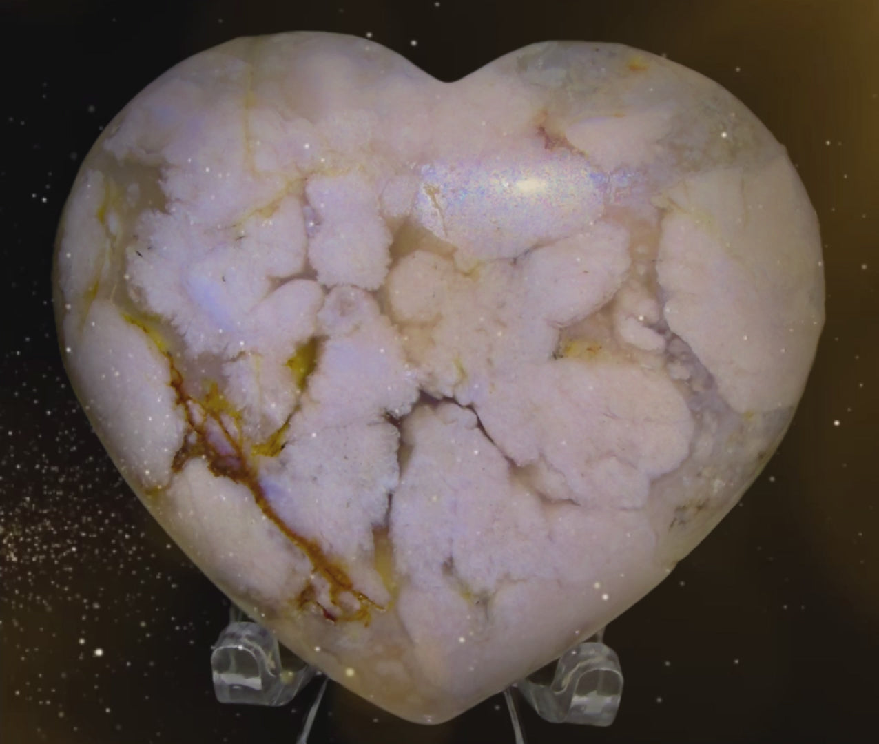 AI generated sparkles on a genuine flower agate crystal carving