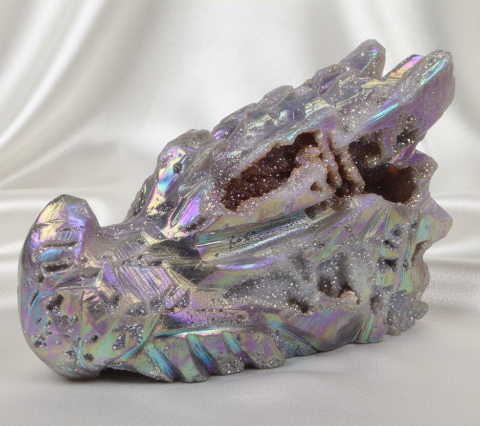 rainbow colors shimmering from he rainbow aura sphalerite dragon skull 
