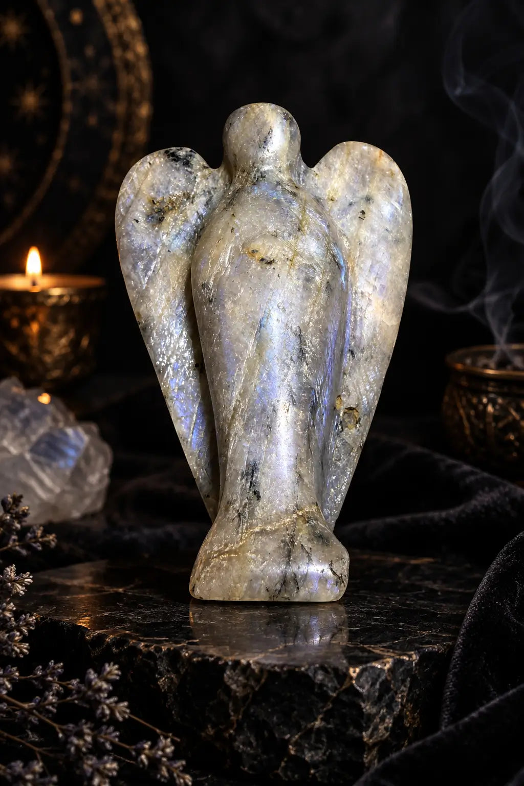 photo carved angel from moonstone. moonstone has blue adularescence. 
