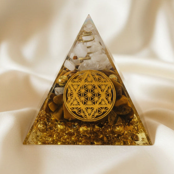 Tigers eye clear quartz and copper bits and coil orgonite pyramid