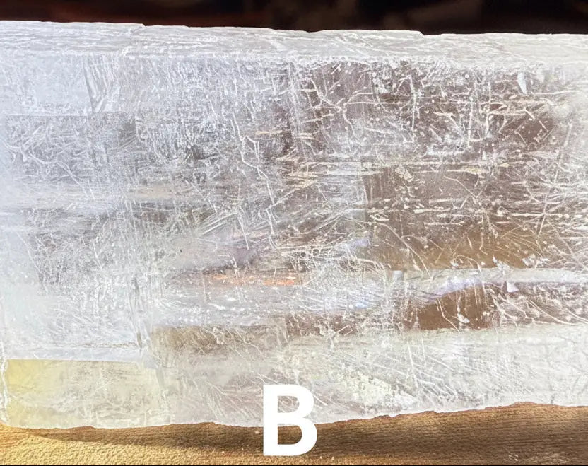close up of white calcite pure natural specimen with cleavage planes 