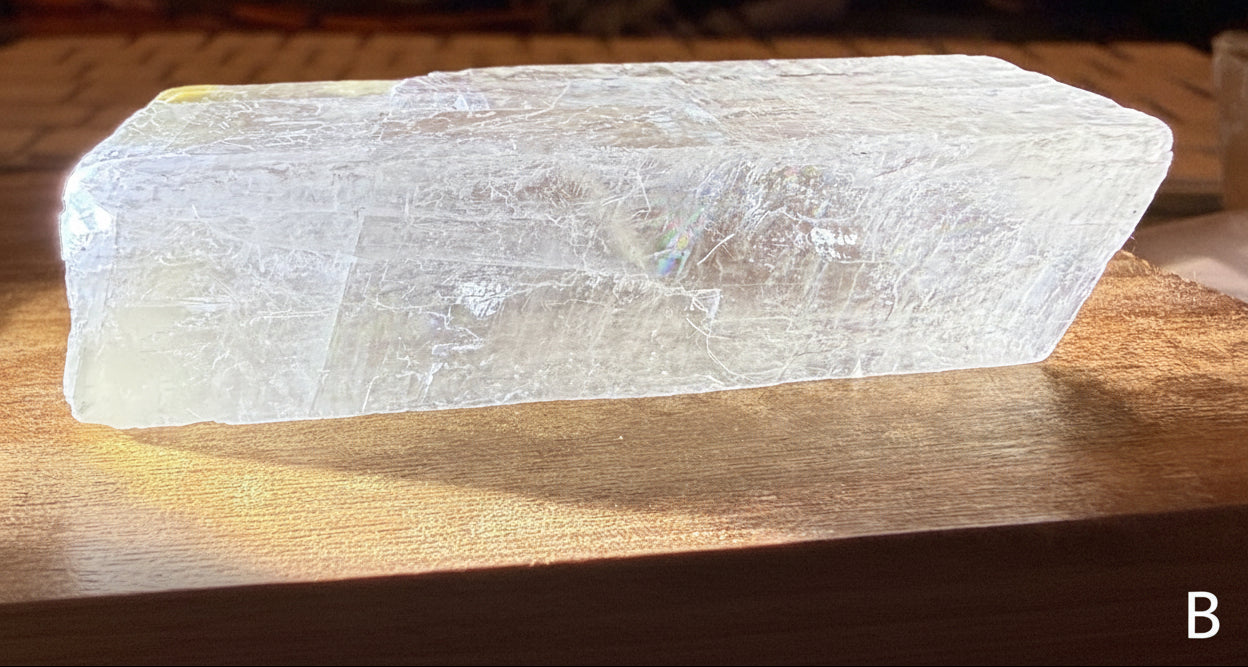 Close up of clear white calcite showing cleavage planes