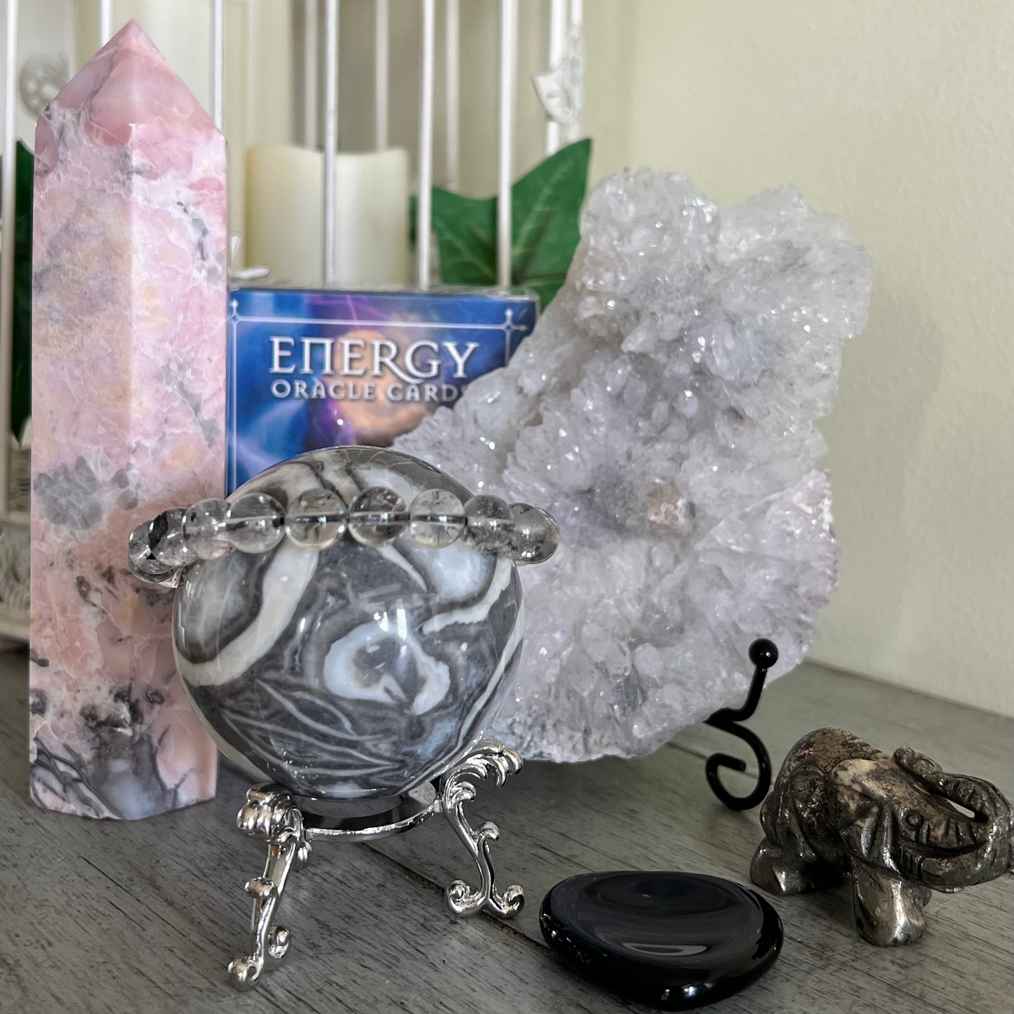 nice close up of entire set pink opal tower, thousand eye sphere pyrite elephant 